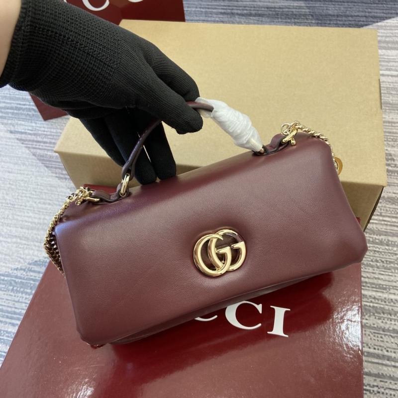G*u*i top handle bags